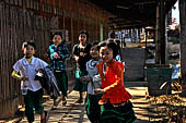 Inle Lake Myanmar. All the buildings are constructed on piles. Residents travel around by canoe, but there are also bamboo walkways and bridges over the canals, monasteries and stupas. 